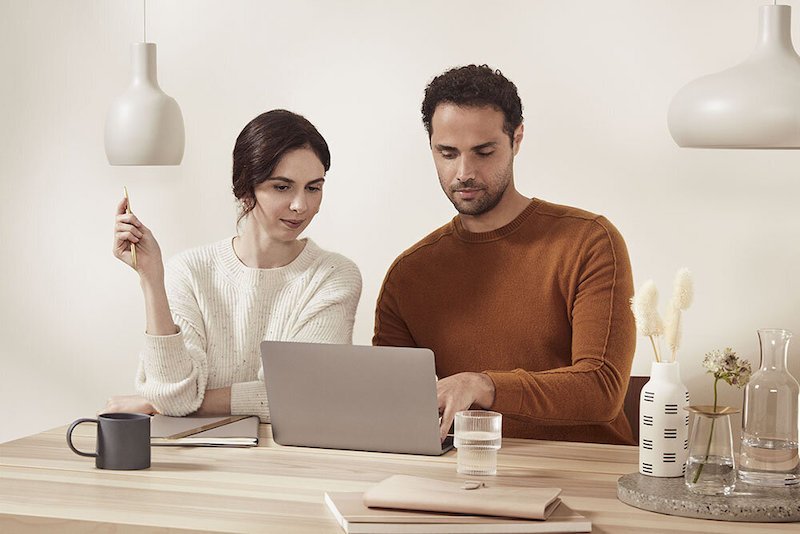 Two web designers collaborating on a project