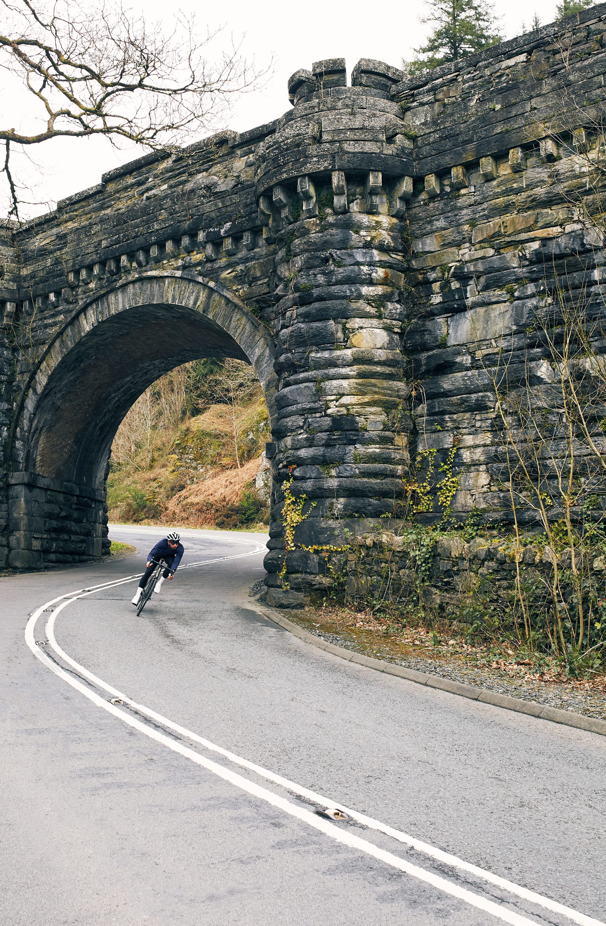 road cyclist descending a corner at speed
